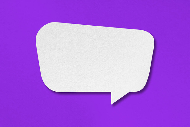 white paper with speech bubbles isolated on purple background communication bubbles design - Foto, Bild