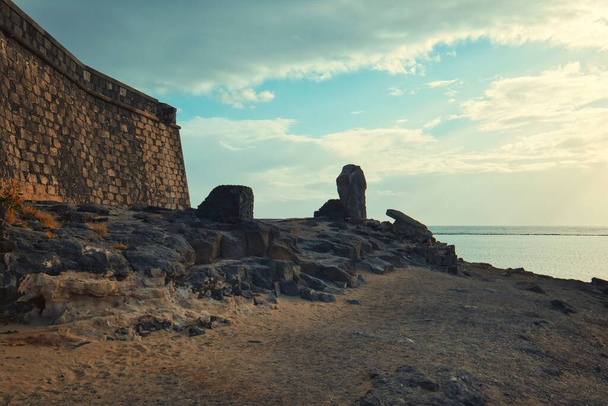 A part of Castillo de San Gabriel on the rocky beach of Lanzarote in the Canary Islands, Spain - Фото, изображение