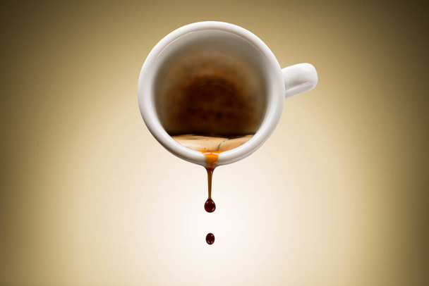 cup of coffee pours dripping coffee, on brown background. - Фото, изображение