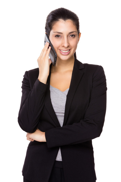 携帯電話で話すビジネスマンの女性 - 写真・画像