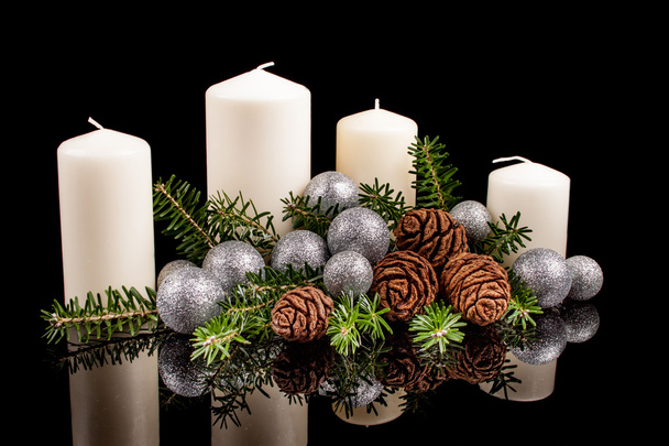 Christmas candles on a black background - Photo, Image