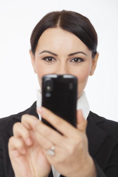Businesswoman with cell phone - Photo, Image