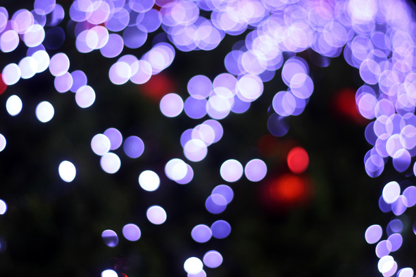 Intreepupil abstract licht bokeh Kerstmis achtergrond  - Foto, afbeelding