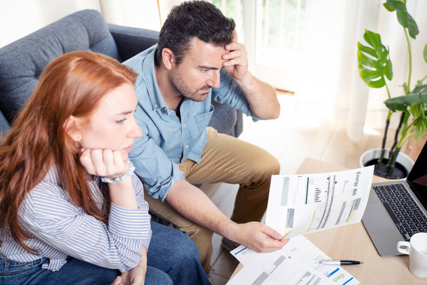 Couple managing the debt unable to pay out loans - Photo, Image