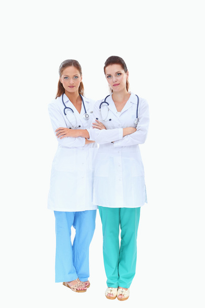 Two young woman doctor , standing in hospital - Foto, Bild