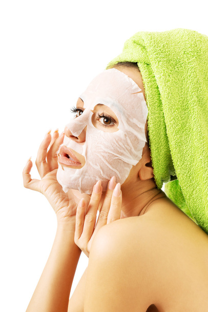 Portrait of a woman with revitality face mask - Foto, imagen