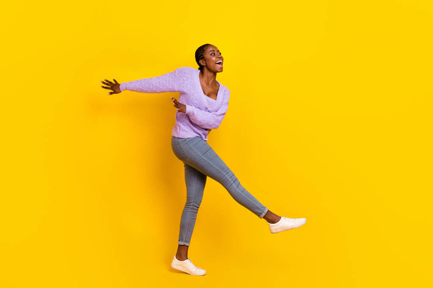 Full size photo of crazy overjoyed person enjoy dancing clubbing isolated on yellow color background. - Фото, зображення