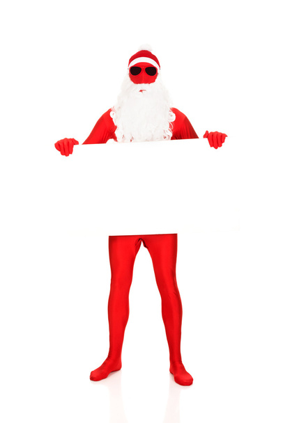 Santa man holding empty banner - Фото, зображення