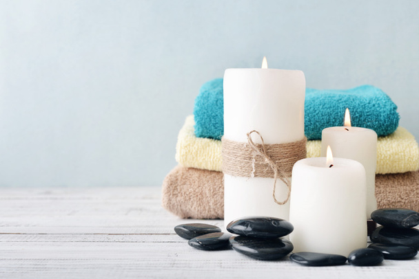 Candles with towels - 写真・画像