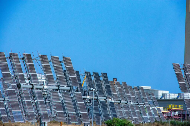 solar panels in the field with blue sky - Valokuva, kuva
