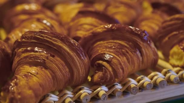 Puff pastry, croissants, puffs. Food industry, confectionery, bakery. Knead, roll out the dough at a large production. High quality 4k footage - Footage, Video