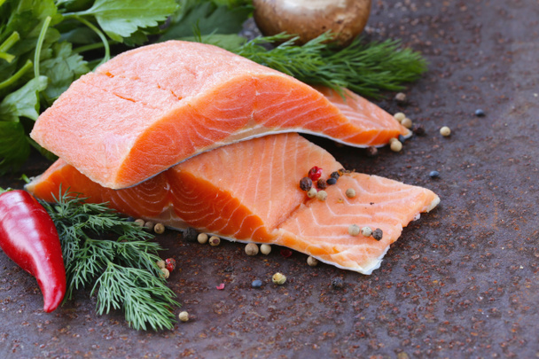 Fresh salmon (red fish) fillet with herbs, spices and vegetables - healthy food - Photo, Image