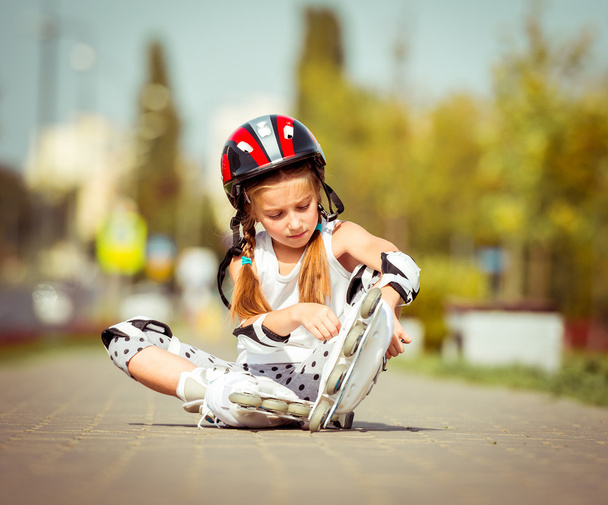 little girl rollerblading - Fotó, kép