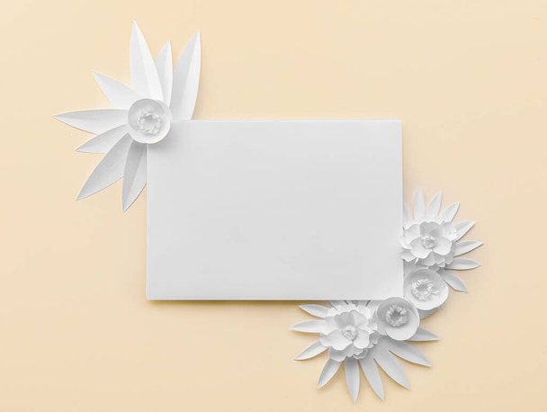 Paper sheet with flowers and leaves on light background - Foto, Imagem