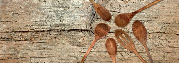 Topview of Set Cooking Wooden Spoons on Table Background - Photo, Image