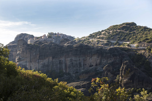 The Greek miraculous monastery on the rock formation, Meteora, Greece. Mysterious hanging over rocks monasteries near Kalabaka - Zdjęcie, obraz