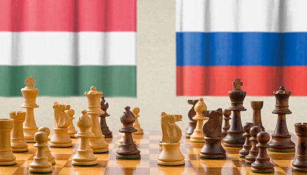 Concept with chess pieces - Hungary and Russia - Photo, Image