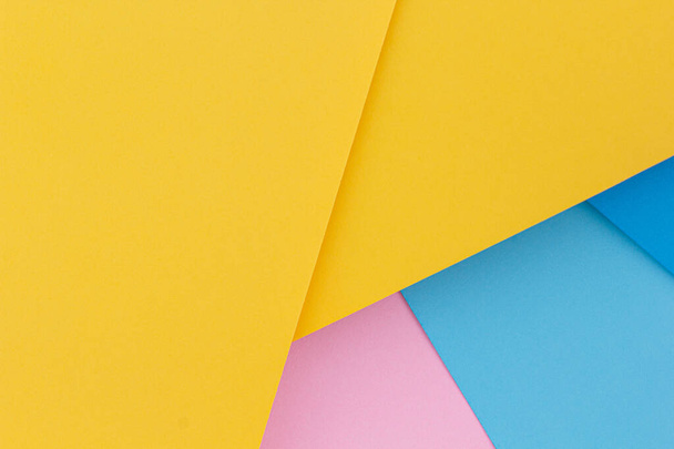 Yellow, blue and pink color paper background - Foto, immagini