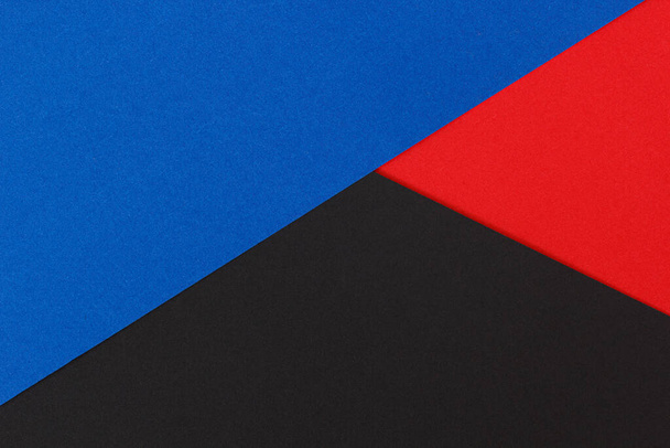 Black, blue and red color paper background - Фото, изображение