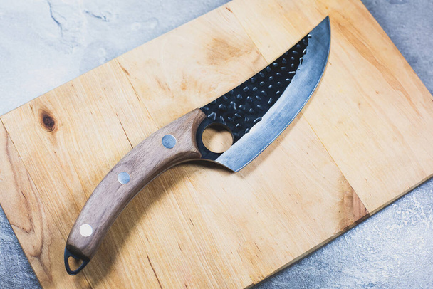 Big kitchen knife with wooden handle. - Foto, Imagen
