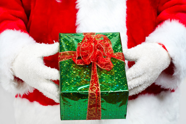 Hands of Santa Claus with gift - Zdjęcie, obraz