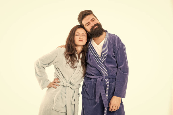 Tired couple of man and woman stand sleeping in cozy robes isolated on white, asleep. - Fotó, kép