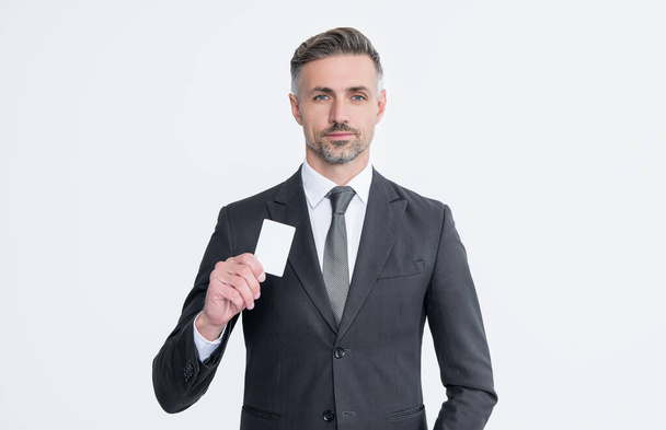 businessman in suit hold business card isolated on white background. - Zdjęcie, obraz