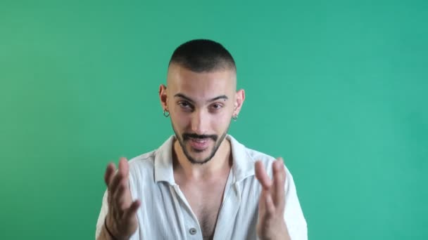 Invitation facial expressions, male model making a come with me sign, making a come sign with both hands, emotions and facial expressions of the model in front of the green screen - Video