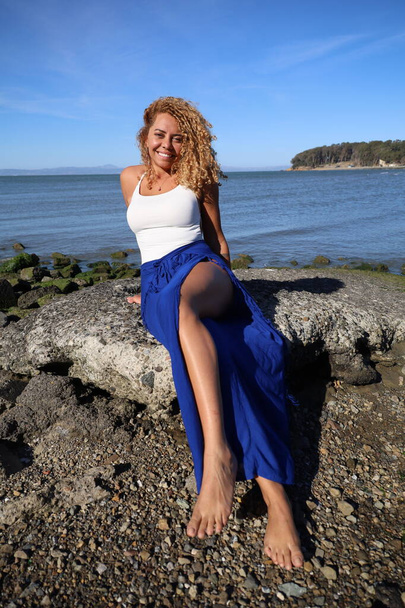 Photo of beautiful Brazilian lady on the beach - Foto, imagen