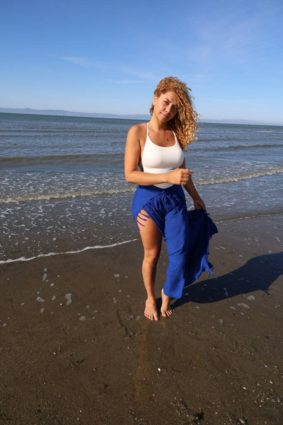 Photo of beautiful Brazilian lady on the beach - Foto, immagini