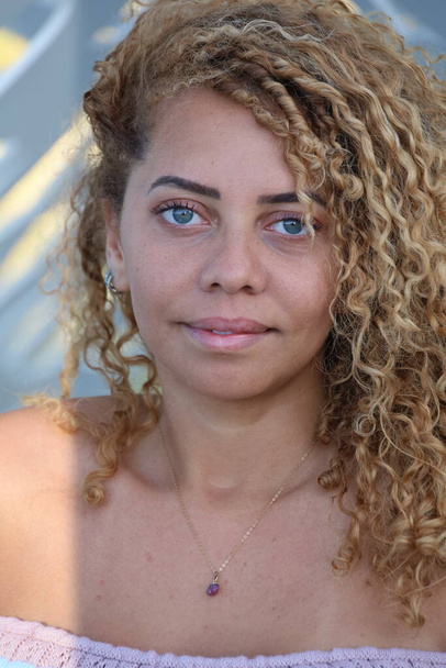 Photo of beautiful Brazilian lady on the beach - Фото, зображення