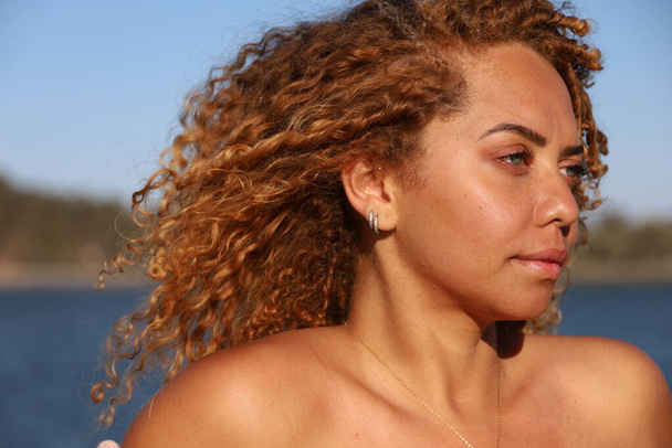 Photo of beautiful Brazilian lady on the beach - Zdjęcie, obraz