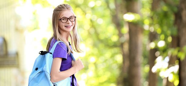 Teenage girl with backpack outdoors - Zdjęcie, obraz