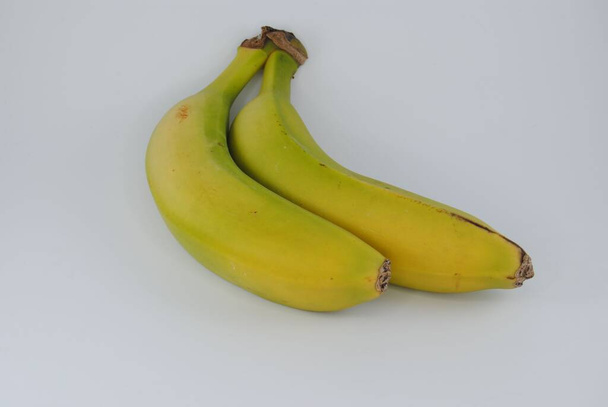 Two bananas in white back - Фото, изображение