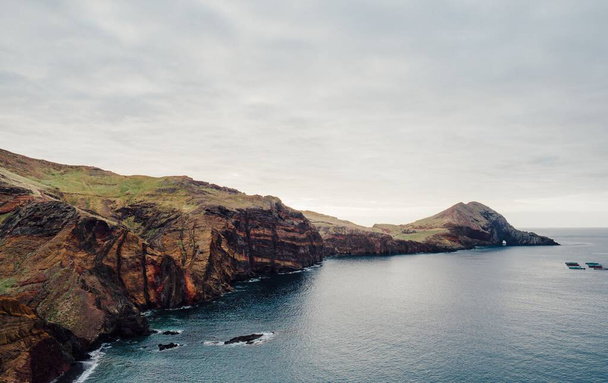 A beautiful coastal landscape with rocky cliffs in Madeira, Portugal - Fotoğraf, Görsel