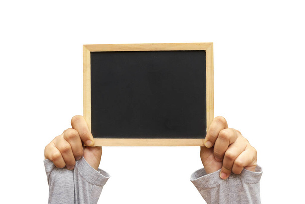 A hand holding an empty black board isolated on a white background. - Valokuva, kuva