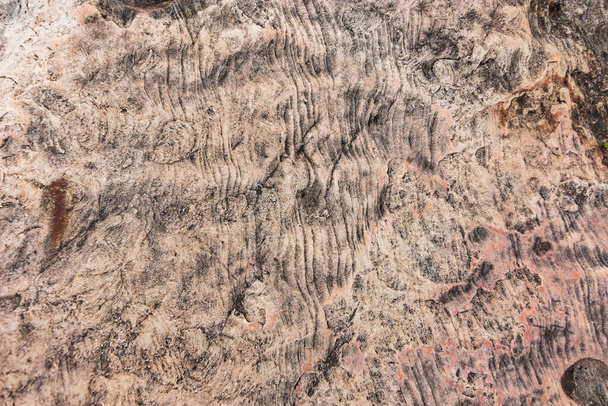 Tekstura kamieni na tle lub tle. ujęcie z bliska powierzchni skały  - Zdjęcie, obraz