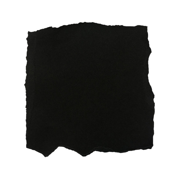 Black scrap paper isolated on a white background. - Foto, Bild