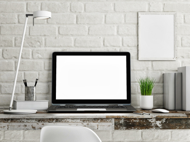 Laptop op houten tafel, witte bakstenen muur - Foto, afbeelding