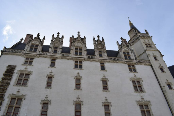 A low angle shot of the facade of Chateau des ducs de Bretagne in Nantes, France - Fotó, kép