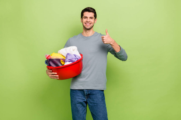 Photo of positive expression casual wear man recommend you cleaning service company isolated on green color background. - Valokuva, kuva