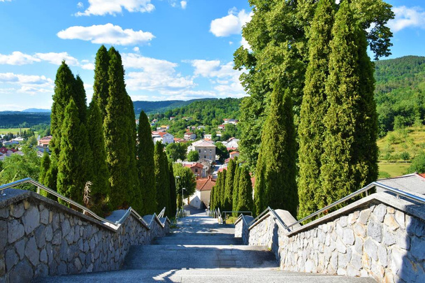 Stairway leading down towards the town of Ilirska Bistrica in Notranjska region of Slovenia - 写真・画像