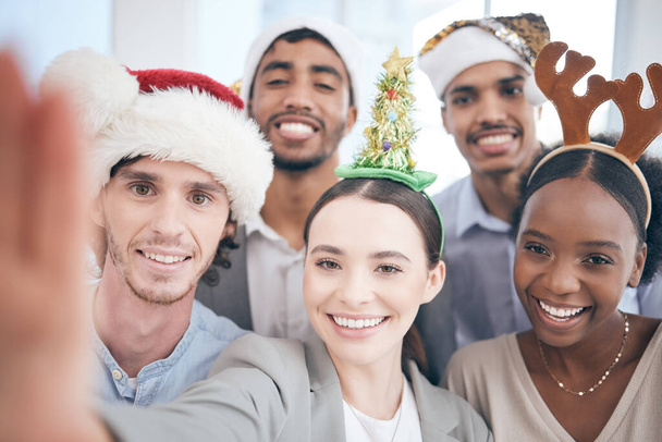 Its the best time of the year. a group of businesspeople taking a selfie at work - Fotó, kép