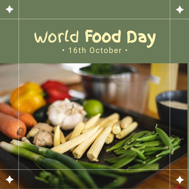 Image of world food day over green background with vegetables. Food, nutrition and food production concept. - 写真・画像