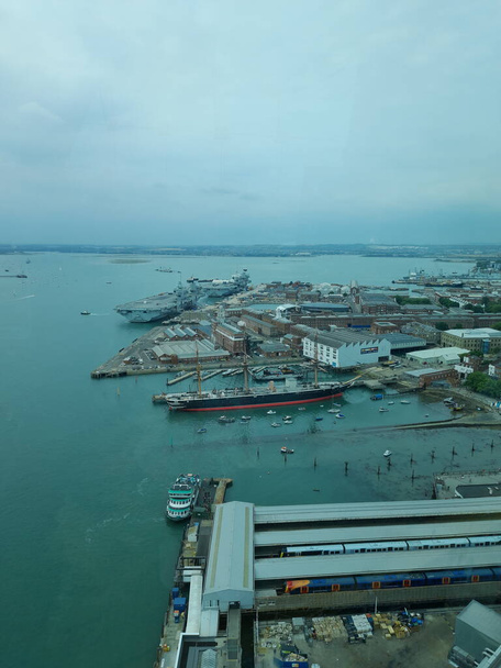 View of HMS Queen Elizabeth, HMS Warrior and the Historic Dockyard Portsmouth from the Spinnaker Tower - Фото, изображение
