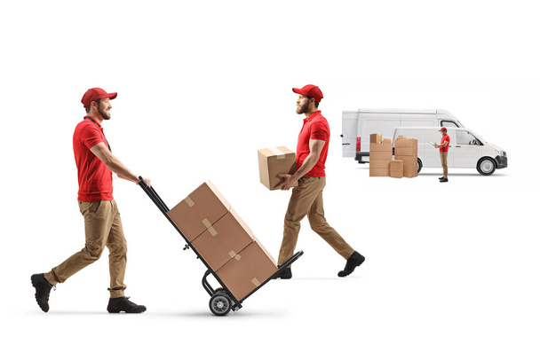 Delivery company workers loading boxes in a transport van isolated on white background  - Φωτογραφία, εικόνα