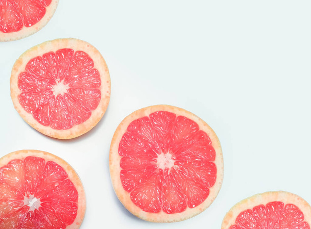  Grapefruit slices, citrus fruit pattern. copy space - Фото, изображение