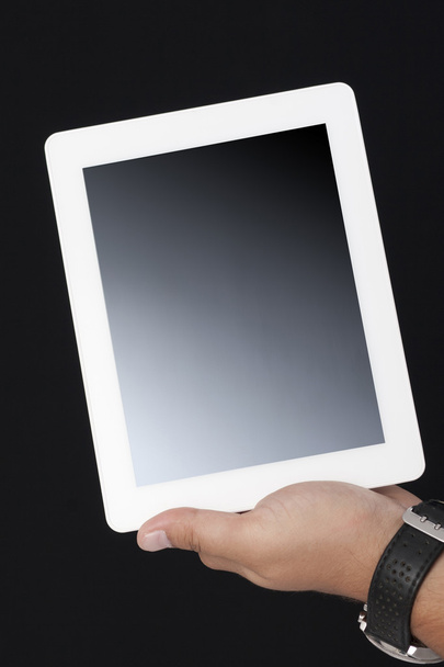 sosteniendo la tableta digital con una mano
 - Foto, Imagen