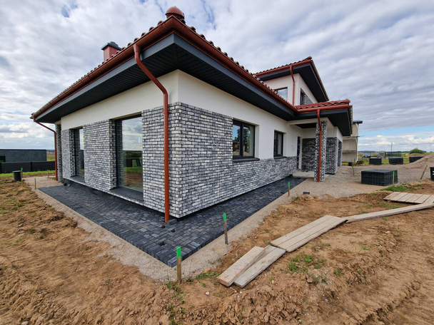 Dark concrete paving under construction in individual house - Foto, afbeelding