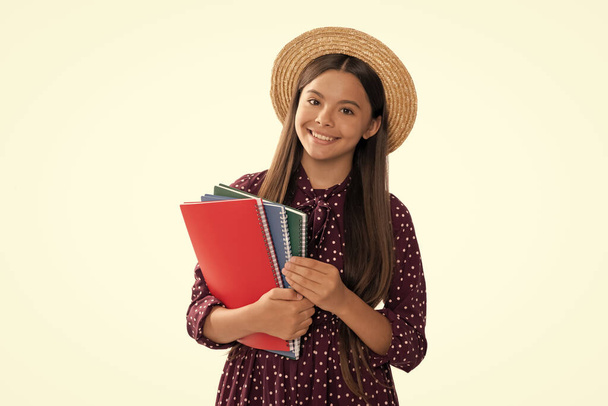 happy teen girl with notebook. back to school. child in straw hat ready to study. childhood development. kid going to do homework. teenager student. high school education. schoolgirl with copybook. - Photo, Image
